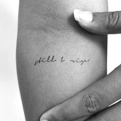 a woman's arm with writing on it