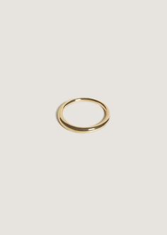 Inspired by Jennie's husband's grandmother's wedding ring, this ring is a perfect circle with soft-edges giving it the appearance of being worn for decades, just as she has worn hers. This is a signature, timeless piece you'll wear for every occasion. 14k solid gold—always Average weight: 2.8g Band width: 2.7mm (front), 1.8mm (back) Height off of finger: 2.4mm This piece cannot be engraved Rib Ring, Initial Disc Necklace, Fall Rings, Perfect Circle, Soft Edges, Figaro Chain Necklace, Horn Necklace, Dome Ring, Average Weight