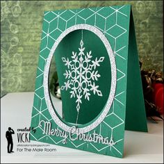 a christmas card with a snowflake on it