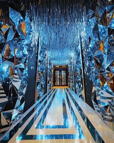 an elaborate hallway with blue and gold decorations