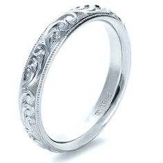 Platinum wedding band. Elegant Rings With Decorative Band For Marriage, Elegant Wedding Jewelry With Milgrain Detail, Elegant Decorative Wedding Bands, Elegant Engraved Promise Ring With Decorative Band, Luxury Engraved Promise Ring With Decorative Band, Elegant Engraved White Gold Bands, Elegant Engraved Ring With Decorative Band For Promise, Elegant Engraved Bands For Marriage, Elegant Engraved Bands For Promise Ring