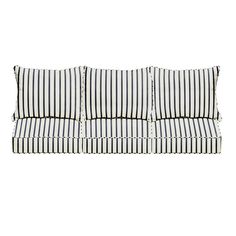 a black and white striped couch with pillows on it's back end, against a white background