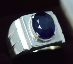 Natural Dark Blue Sapphire Ring, Mens Real Stone Rings, Beautiful Handmade Ring Design Christmas Gift For Men Best Quality Stone Used Resizing is free. All ring sizes are available We have fast delivery service as you can guess by reviews Note: Video of this ring is available. Please contact if you want to watch ring video. Thanks! Benefits of Sapphire Stone! Astrological benefits of wearing blue sapphire - Blue Sapphire Stone is a highly protective gemstone that helps protect against enemies, e Blue Sapphire Ring Gift, Sapphire Halo Ring For Gift, Christmas Ornament Gifts, Rings Beautiful, Blue Sapphire Stone, Watch Ring, Ring Video, Rings Handmade, Blue Sapphire Ring