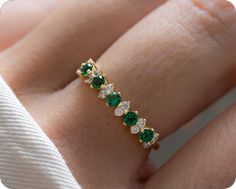 Green Half Eternity Stackable Rings Fine Jewelry, Green Emerald Stackable Rings With Prong Setting, Green Cubic Zirconia Round Band Rings, Green Emerald Cut Stackable Rings, Fine Jewelry Green Emerald Cut Stackable Rings, Fine Jewelry Green Emerald Stackable Rings, Fine Jewelry Green Emerald-cut Stackable Rings, Green Emerald-cut Stackable Diamond Ring, Emerald Cut Green Stackable Rings Fine Jewelry