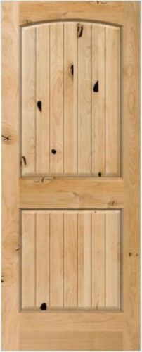 a wooden door with two panels on each side and one panel in the middle,