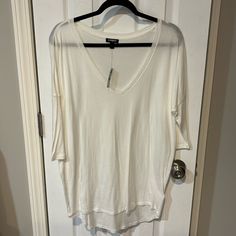 New With Tags, Women’s White, Oversized Tunic Style T Shirt With Half Sleeves And A Deeper V Neckline Than Normal. Perfect For Summer Beach Look! Express Brand Size Large. My Whole Closet Is Buy 2 Get 1 Free Or 20% Off Of Bundles Of 2 Or More. Spring Oversized V-neck T-shirt, Oversized V-neck Shirt For Day Out, Oversized V-neck T-shirt For Spring, Trendy Oversized V-neck Shirt, Trendy Short Sleeve Tops For Daytime, Oversized Summer Tops For Daytime, Oversized Tops For Summer Daytime, Casual V-neck Tops For Daytime, Oversized White V-neck Top