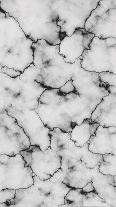 black and white marble textured wallpaper that looks like it has been painted in different shades