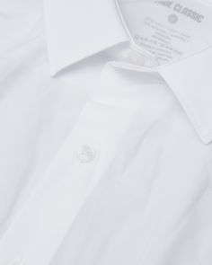 Say yes to that RSVP with the perfect blend of style and stretch. This ultra-lightweight dress shirt features a quick-dry performance fabric with 4-way stretch to keep you comfortable long after the sun goes down. Features: 4-way stretch Quick-dry Ultra-soft Lightweight and breathable 87% Nylon/13% Spandex Fit: Slim fit in arms and shoulders Room through the body Size up for a looser fit Model is 6'0" and wearing size L Slim Fit Summer Dress Shirt For Business, Summer Slim Fit Dress Shirt For Business, Slim Fit Summer Business Dress Shirt, Summer Business Slim Fit Dress Shirt, Classic Slim Fit Wrinkle-resistant Tops, White Long Sleeve Wrinkle-resistant Shirt, White Slim Fit Dress Shirt For Daywear, Fitted White Dress Shirt For Daywear, White Fitted Dress Shirt For Daywear