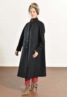 "MDP Mario De Pinto/ Vintage Wool Dress Coat/ 80's Black Wool Overcoat/ 80's Black Dress Coat/ Black Wool Dress Coat/ Size M Incredible 100% wool dress coat is beautiful condition inside and out! Everyone should have an 80's overcoat in their wardrobe. This coat hangs so elegantly and has a slight swing to it! Has significant shoulder pads and falls so strikingly from the shoulders. Black twisted cord pipping throughout. Distinctive cuffs with black buttons. Large black buttons up the front. Sid Retro Black Wool Outerwear, Black Retro Wool Outerwear, Classic Black Outerwear For Daywear, Classic Black Daywear Outerwear, Vintage Black Outerwear For Work, Black Outerwear With Button Closure For Daywear, Black Wool Dress, Harem Pants Jumpsuit, Black Dress Coat