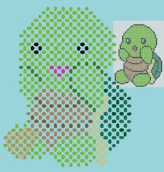 a cross stitch pattern of a green turtle holding a teddy bear