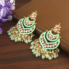 Our ears are the most eye-catching attraction of face. Earrings are the one of the major body adornment people observe when looking at you. We make your entire look stand out just by decorating your ears with our unique pearl cluster earrings in Indian Style. The Earrings we make is of the highest quality, both materials & craftsmanship wise. Treat yourself to it. It'll be your best friend. ❖ ❖ ❖ Features ❖ An Indian styled dainty Meenakari Kundan Earrings. ❖ Made from fine Quality Brass with Gold Platting. ❖ Ready to be given as a gift. ❖ Easy and Convenient way to Wear. ❖ It looks prettier than the images. Direct Images on hand is also attached. Size of Earrings & Other Details ❖ Item Code:- L3119 ❖ Length:- 90mm approx ❖ Width:- 45mm approx ❖ Material:- Fine Quality Brass with Gold Plat Bridal Jewelry Gold, Bridesmaid Pearl Earrings, Pearl Cluster Earrings, Bridesmaid Pearls, Body Adornment, Face Earrings, Kundan Earrings, Pearl Cluster, Bridal Gold Jewellery