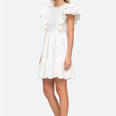 Nwt - Size Medium White Eyelet Mini Dress Features Flutter Sleeves And Scallop Hem Cutout At The Back With Tie Closure Side Zip 100% Cotton Broderie Anglaise Mini Dress With Short Sleeves For Brunch, Summer Dresses With Broderie Anglaise And Flutter Sleeves, Spring Dresses With Broderie Anglaise And Flutter Sleeves, Feminine Broderie Anglaise Mini Dress For Brunch, Summer Flutter Sleeve Dresses With Broderie Anglaise, White Ruffle Sleeve Mini Dress For Summer, Broderie Anglaise Mini Dress For Brunch, White Flutter Sleeve Mini Dress For Vacation, White Ruffle Sleeve Mini Dress For Vacation