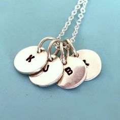 These little guys are new today! Add charms to create a custom mother's or monogram necklace. Tiny Initial Charm Necklace in Sterling Silver by esdesigns Baby Shower Necklace, Letter Charm Necklace, Silver Bridesmaid, Tiny Charm, Love Jewelry, Friendship Necklaces, Mothers Necklace, Monogram Necklace, Clay Necklace