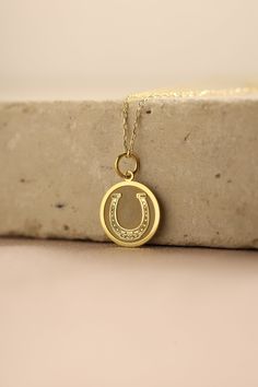 Gold Horseshoe Pendant - Lucky Charm Gold Necklace ● Material of pendant: Solid Gold 14k ( REAL GOLD ) ● Metal Stamp: 14k ( REAL GOLD ) ● The pendant is available in 5 sizes: - 12,7 mm / 0.5 inches (Diameter) - 14,0 mm / 0,55 inches ( Diameter ) In the photos - 15,3 mm / 0.6 inches ( Diameter ) - 16,5 mm / 0,65 inches ( Diameter ) - 19,1 mm / 0,75 inches ( Diameter ) ( In the photos the size is 14mm / 0.55 inches Diameter ) ( Jump Ring inner diameter: 4 mm ) ● Material of chain: Solid gold 14k ( Horseshoe Shaped Engraved Jewelry Gift, Engraved Horseshoe Jewelry Gift, Engraved Horseshoe Jewelry For Gift, Personalized Horseshoe Necklace For Gift, Gold Horseshoe Charm Necklace As Gift, Gold Horseshoe Charm Necklaces As Gift, Gold Horseshoe Charm Necklace For Gift, Gold Horseshoe Necklace For Gift, Yellow Gold Horseshoe Necklace Gift