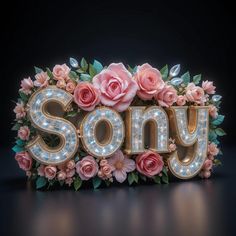 the word sony spelled with flowers and leaves in front of a black background that says,