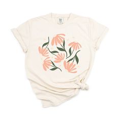 Looking for a cute versatile top to wear this summer? Make sure to grab one of our Pink Daisies garment dyed graphic tees! This soft and comfortable graphic tee is the perfect top for any outfit. It can be paired with biker shorts, jeans, or even a simple skirt/dress! This tee is true-to-size, so be sure to order your regular t-shirt size! If you are looking for a more oversized look, make sure to size up! White Organic Cotton Tops For Spring, Cream Cotton T-shirt With Graphic Print, Spring Relaxed Fit T-shirt With Watercolor Print, Pink Organic Cotton Top For Summer, Pink Relaxed Fit Organic Cotton Top, Cream Short Sleeve Soft-washed Top, Cream Soft-washed Short Sleeve Top, Soft-washed Cotton T-shirt For Summer, Soft-washed Cotton Cream Tops