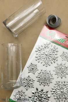 the supplies needed to make this paper snowflake craft