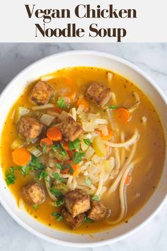 vegan chicken noodle soup in a white bowl