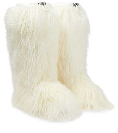 Lake Louise shearling boots White Sheepskin Boots For Winter, White Boots With Faux Fur Lining, Winter White Sheepskin Boots, Shearling Boots With Lug Sole And Round Toe, Luxury Sheepskin Round Toe Boots, White Sheepskin Winter Boots, White Faux Fur Boots With Round Toe, White Faux Fur Trimmed Boots, Luxury Shearling Boots With Round Toe