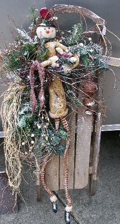 a wooden crate with a christmas decoration on it