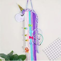 Unicorn Decorative Wall Hanging Beautiful Decor Holder For Hanging Your Girl’s Bows, Clips And Headbands Or Simply Use To Decorate Your Baby Girls Room Or Teenager Size: 26.6” H X 9.8” L X 1.5” W Face Is Made Out Of Felt Material With Padding Inside. The Eyelashes And Make Up Are Only On The Front. Horn Is Made Of A Gold Glittery Material. Beautiful Yarn - Soft Hues Of White Pink, Green, Lavender And Purple Yarn What A Great Baby Shower, Birthday Or Christmas Gift Hair Bow Storage, Hair Clip Storage, Hair Clip Organizer, Bow Storage, Headband Organizer, Hair Accessories Storage, Bow Organizer, Bow Hanger, Hair Clip Holder