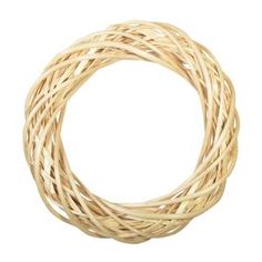 a round wreath made out of wicker hanging from a rope on a white background