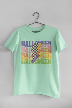 🖤 Product Details:- 100% Soft Ring-Spun Cotton- Light fabric that runs true to size- Unisex- Made in the USA 🇺🇸 🖤 Description:Step into the Halloween season with our Halloween Retro Groovy T-Shirt, an absolute must-have for all you cool cats and spooky enthusiasts out there! Embrace the vintage vibes of the 70s with this rad tee that features vibrant and psychedelic Halloween-themed graphics. Perfect for those who love all things groovy, funky, and Halloween. Whether you're hitting a costume Multicolor Cotton Top For Halloween, Casual Green Halloween Top, Green Graphic Tee For Fall, Green Screen Print T-shirt For Fall, Fun Fan Merchandise T-shirt For Fall, Halloween Multicolor Cotton Top, Fun Halloween Graphic Print T-shirt, Retro Halloween Fan Merchandise Top, Fun Halloween T-shirt With Screen Print