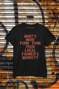 "KEEP SHOPPING - ☠️ VIEW MORE PUNK SHIRTS: https://www.etsy.com/search?q=crypto ZOO&ref=search_bar 🔥 MORE FROM CRYPTO ZOO: https://www.etsy.com/shop/TheCryptoZoo -------------------------------- Are you a punk with a passion for sustainable living? Do you want to show the world that there's nothing more punk than supporting your local farmer's market? Then our new t-shirt is perfect for you! Featuring the bold statement \"What's more punk than your local farmer's market?\", this shirt is the pe Punk Shirts, Folk Punk, Rock Clothing, Punk Rock Outfits, Punk T Shirt, Punk Rocker, Classic Horror Movies, Vegan Shirt, Ramones