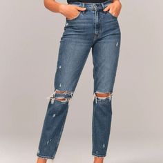 On-Trend High Rise Mom Jeans In A Dark Wash With Distressed Details And Frayed Hem. Imported. Size 30/10 Regular. Body:99% Cotton, 1% Elastane To Avoid Color Transfer, Wash Before Wear, Turn Garment Inside Out Machine Wash Cold, With Like Colors Do Not Bleach Tumble Dry Low Warm Iron If Needed Do Not Dry Clean Blue Mom Fit Jeans For Fall, Distressed Mom Jeans, Abercrombie Jeans, Love Jeans, Abercrombie And Fitch Jeans, Relaxed Jeans, Mom Jean, High Rise Mom Jeans, Striped Jeans