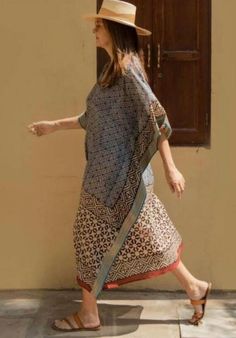 Women's Summer Cotton Short Kaftan, a stylish and comfortable garment perfect for warm weather and resort wear. This kaftan features Indian block print designs, handmade silk Jari border detailing, and a loose kimono-style fit that makes it ideal as a beach cover-up or casual dress.   Crafted from lightweight and breathable cotton fabric, this kaftan ensures comfort and ease of wear, even on the hottest summer days. The soft and natural feel of cotton makes it a perfect choice for lounging by the pool or strolling along the beach. The kaftan is adorned with intricate Indian block print designs, adding a touch of traditional craftsmanship and cultural flair to the garment. Each print is meticulously handcrafted, creating a unique and artisanal look. Enhancing the elegance of the kaftan is t Beach Kurta For Summer In Maxi Length, Multicolor Kurta With Kimono Sleeves For Beach, Beach Kurta With Multicolor Kimono Sleeves, Summer Vacation Kurta With Kimono Sleeves, Casual Beige Kaftan For Beach, Long Kurta For Summer Vacation, Straight Kurta For Summer Vacation, Summer Vacation Straight Kurta, Traditional Beige Kimono For Vacation