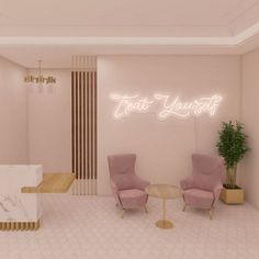 a room with two chairs and a table in front of a neon sign that says treat yourself