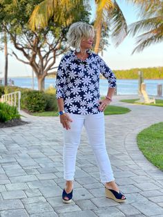 92% Nylon / 8% Spandex. Cathy is wearing a medium and is 5/6 Stretch knit top. Scoop neckline. 3/4 sleeve. Asymmetrical hemline. UPF 50 sun protection. Pre-shrunk. Center back length: 25 inches. Machine wash. Imported. Online and in stores. Style Number: SPX0702 Summer Tops With Upf 50+ And Stretch, Summer Stretch Tops With Upf 50+, Spring Crew Neck Tops With Upf 50+, Fitted Half Sleeve Beach Tops, Casual Stretch Tops With Upf 50+, Fitted Tops For Warm Weather, Fitted Beach Top With 3/4 Sleeves, Fitted 3/4 Sleeve Top For Beach, Fitted Top With 3/4 Sleeve For Beach