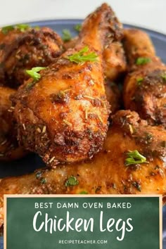 the best damn oven baked chicken legs recipe on a blue plate with text overlay