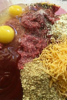 an image of ingredients in a bowl to make meatloaf