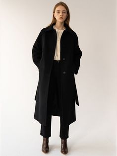 Editor's NotesWoven from wool and cashmere blend, this maxi-length coat has a wide collar, concealed button fastenings and a detachable self-tie belt. Relaxed fit makes it easy to layer with various winter inner items.- Wool and cashmere blend fabric- Maxi length- Wide collar- Concealed single button fastenings through front- Detachable self-tie belt- Buttoned cuffs- Back ventMeasurements(in.)Size One Size(XS-M)- Length: 47.64 in- Armhole: 12.99 in- Bust: 21.26 in- Sleeve length: 27.95 in- Sleeve width: 6.30 in* Model info: Height 5' 9 Bust 33.5 Waist 24.5 Hip 35.5, wearing size One SizeComposition & Care- 90% Wool, 10% Cashmere / Lining: 100% Polyester - Dry cleaningDesigner- Made in Korea- by KINDERSALMON Mens Outerwear, Men Shoes Size, Tie Belt, Black Coat, Wool Coat, Mens Bottom, Cashmere, Normcore, Jackets & Coats