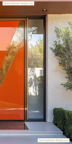 an orange front door with glass panels and plants in the foreground on a sunny day