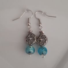 Beautiful Handcrafted Boho Earrings Silver Tone With Gorgeous Silver And Aquamarine Beads . Makes A Great Gift . Blue Metal Beaded Earrings For Gift, Blue Drop Earrings With Silver Beads, Adjustable Blue Earrings With Silver Beads, Blue Dangle Earrings With Silver Beads, Blue Round Beaded Metal Earrings, Silver Beaded Round Earrings Gift, Silver Beaded Round Earrings For A Gift, Handmade Blue Beaded Metal Earrings, Silver Beaded Metal Earrings As Gift