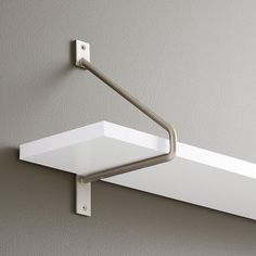 The Maylee Brass Shelf Bracket is the perfect accent for adding minimalistic appeal to your home. Boasting a thin silhouette, this versatile piece complements design styles stemming from mid-century modern to traditional. Made of durable brass, the Maylee is sure to withstand years of use. Choose your favorite finish to complete the look. Mounting hardware is included. | 9-3/4" - Maylee Brass Shelf Bracket - Brushed Nickel - Signature Hardware Brass Shelf Brackets, Brass Shelf, Brass Towel Bar, Brass Shelves, Pedestal Tub, Console Sink, Acrylic Tub, Wall Shelves & Ledges, Georgia Homes