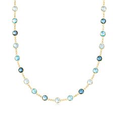 Ross-Simons - 29.00ct t. w. Tonal Blue Topaz Station Necklace in 14kt Yellow Gold. 18". Shimmering shades of blue adorn this glamorous gemstone necklace! Crafted in polished 14kt yellow gold, the design flaunts 29.00 ct. t. w. Swiss, London and sky blue topaz rounds that shine in sunny settings along a dainty cable chain. Lobster clasp, tonal blue topaz station necklace. Blue Topaz birthstones are the perfect gift for December birthdays. London Blue Topaz Necklace, Topaz Birthstone, Blue Topaz Necklace, Blue Topaz Pendant, Blue Stones, Rainbow High, Sky Blue Topaz, Station Necklace, Swiss Blue Topaz