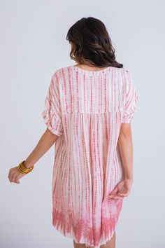 V-neck Lined Cuffed Sleeve Frayed Hem Fits slightly oversized Model is 5'10", wearing a small. Breezy V-neck Dress With Ruffle Hem, Summer V-neck Tie-dye Dress, Pink V-neck Mini Dress With Ruffle Hem, Spring Tie-dye V-neck Dress, Spring Tie Dye V-neck Dress, Pink Tie Dye, Pink Ties, V Neck Dress, Tie Dye