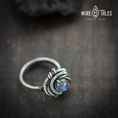 Unique bohemian style wire wrapped Silver filled Ring with natural labradorite gemstone The ring wrapped with silver filled copper wire that has a 10% plating of silver. It was oxidized to create antique look and to highlight the details of the wire work. Ring size US: 6 If you want different size, please don't hesitate to contact me, I will make a similar ring with the size you want :) ----- How to measure size of your ring size: https://www.wikihow.com/Find-Your-Ring-Size Properties of Labrado Bohemian Hand-wrapped Metal Jewelry, Adjustable Labradorite Gemstone Jewelry, Nickel-free Bohemian Promise Ring Jewelry, Bohemian Nickel-free Jewelry For Promise Ring, Spiritual Hand-wrapped Moonstone Jewelry, Bohemian Hand-wrapped Labradorite Jewelry, Spiritual Hand Wrapped Moonstone Jewelry, Adjustable Spiral Wire Wrapped Jewelry, Hand Forged Silver Jewelry In Copper Wire