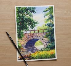 a watercolor painting of a bridge over a river