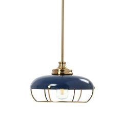 a brass and blue pendant light with a glass shade on the bottom, against a white background