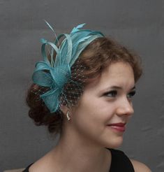 Teal fascinator. Elegant wedding fascinator, where I have used two shades of teal fabrics next to each other. Will be made to order according to your wishes at what side of your head you want to wear it. Choose your option from the variations. Choose your attachment option also from the variations. Available options are following: Clip; Comb, Silver metal headband, Golden metal headband, Black metal headband or fabric covered headband (same fabric the fascinator is made from) SHIPPING: Shipped f Teal Fascinator, Butterfly Headpiece, Wedding Reception Planning, Bridal Fascinator, Black Fascinator, Metal Headband, Headband Black, Mini Hats, Turquoise Wedding