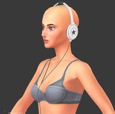 a woman with headphones is wearing a bra and has her hands on her hips