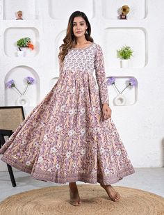 This printed dress is presented to you, A well-known brand in hand block prints from over 9 decades. This exclusively hand stitched dress is made of 100% pure cotton fabric with having printed prints over it. The dress is best suitable for you to showcase your women hood. Wear this at your ease and the fabric is so smooth to skin that you will love it and the attractive prints adds more charm to the same. Material : 100% Cotton Dress Length : 51 Inches Disclaimer : As the fabric is block printed Beige Cotton Dress With Chikankari Embroidery, Long Sleeve Mulmul Dress With Printed Motifs, Printed Anarkali Dress With Long Sleeves, Printed Long Sleeve Anarkali Dress, Traditional Cotton Maxi Dress, Traditional Printed Patterned Maxi Dress, Traditional Patterned Printed Maxi Dress, Cotton Straight Kurta Dresses For Spring, Multicolor Cotton Maxi Dress With Floral Print