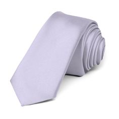 This lilac premium tie is cut in our skinniest and trendiest 2-inch width. Its heavyweight woven material and smooth satin finish provides a sharp look that is suited for your most formal occasions.We recommend this shade for a pale purple color. See it in person by requesting a free color swatch. Product Features • Skinny 2" width, at the widest point • 57" length, tip to tip• Color is lilac • Made from 100% Polyester Microfiber • Smooth, satin finish • Imported Lavender Ties Groomsmen, Light Grey Suit Purple Tie, Groom Light Purple Tie, Bridesmaids Essentials, Elegant Lavender Standard Tie, Formal Purple Standard Tie, Junior Groomsmen, Cream Suit, Light Spring Colors