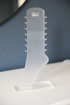 a white plastic object sitting on top of a table