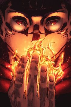 a close up of a person holding their hands in front of his face with flames coming out of it