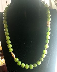 A good quality nephrite jade necklace of 10 mm 46 cm festive golden supply for women Vintage: before 2004 materials: natural apple green jade gem, gold metal Necklace length 46 cm clasp: magnetic gold metal  jade beads size:10mm in diameter In very good condition Necklace in a magnificent green color, original, good gift for women Gift wrapping is free Gold Jade Necklace With Gemstone Beads, Gold Jade Necklaces With Round Beads, Gold Jade Beaded Necklaces With Gemstone Beads, Gold Jade Beaded Necklaces With Gemstones, Gold Jade Gemstone Beaded Necklaces, Spiritual Gold Jade Beaded Necklaces, Spiritual Gold Jade Beaded Necklace, Gold Jade Necklaces With Polished Beads, Jade Bead Necklace